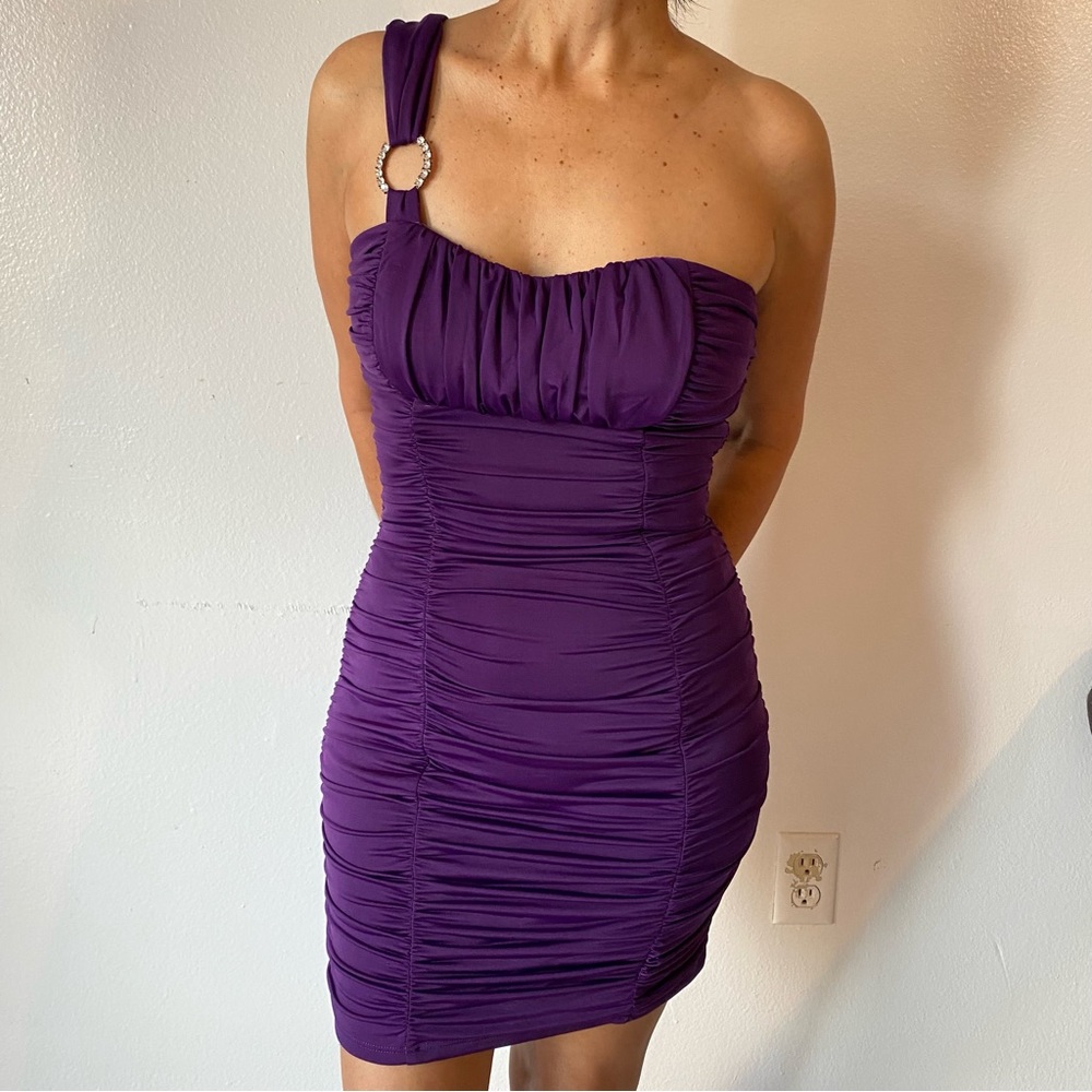Dark purple, one shoulder dress in a size small.